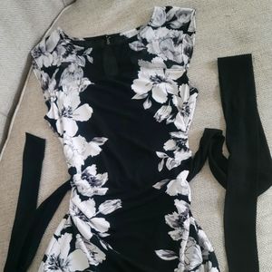 WHBM Blouse in Black and White and size XS.